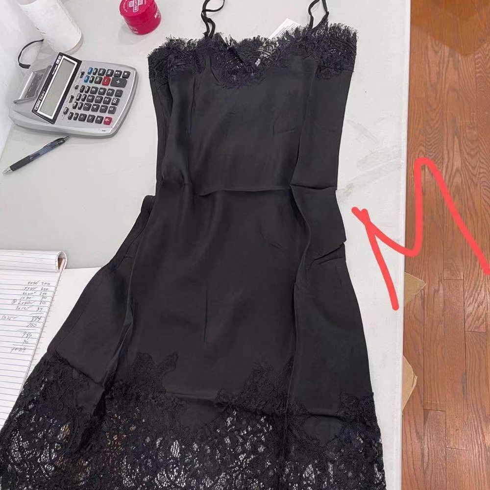 gold hawk black silk dress